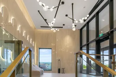 a room with a staircase and a chandelier at Trafalgar in Oakville