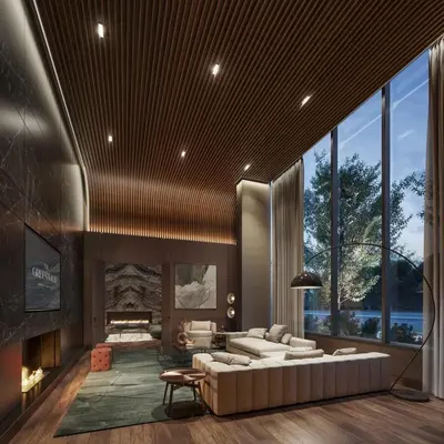 a living room with a couch and a fireplace at Trafalgar in Oakville