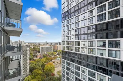 an aerial view of buildings in a city at Modern Downtown Retreat 3BR Condo with Patio in Toronto