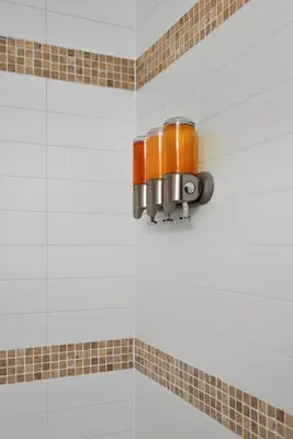 a light on the wall of a bathroom at Sleek Sq 1 Downtown Condo - 4 beds - Parking in Mississauga