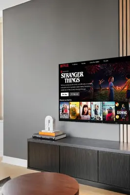 a flat screen tv on a wall in a living room at Stylish 2br High-Rise - Sleeps 7 - YYZ in Mississauga