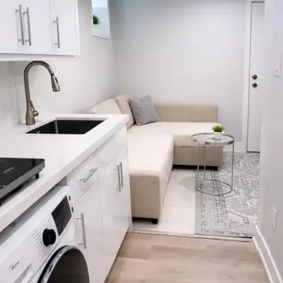 Studio Basement Suite with Sofa Bed and kitchen