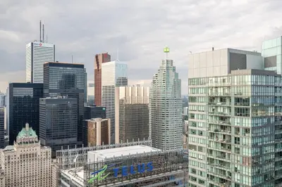 a view of a city skyline with tall buildings at Lake view Studio Condo High Floor Downtown Toronto in Toronto
