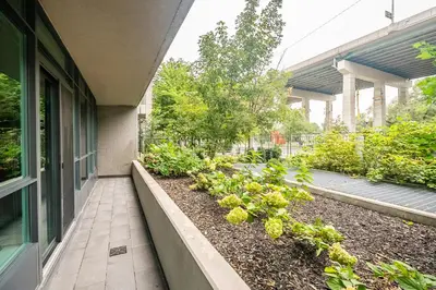 a garden on the side of a building at Private Entrance 2 Bedroom Condo Downtown Toronto in Toronto