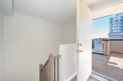a room with a white door and a balcony at Centrally Located 3-Bedroom Townhouse in Vaughan in Vaughan