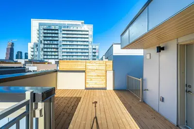 a balcony with a view of a building at Centrally Located 3-Bedroom Townhouse in Vaughan in Vaughan
