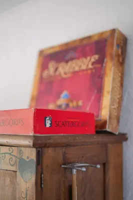 two books sitting on top of a wooden table at The County Haus - Indoor Pool & Finnish Sauna in West Lake