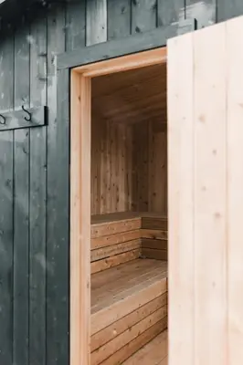 an empty sauna in a wooden building at The County Haus - Indoor Pool & Finnish Sauna in West Lake