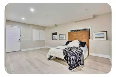 a bedroom with a bed in a room at Riverside Dreams in Wasaga Beach