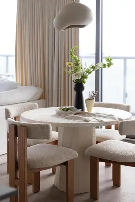 a dining room with a table and chairs at King Suites Toronto Downtown Soho District in Toronto