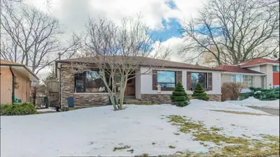 a house with snow on the ground in front of it at Cozy 2- bedroom private basement! in Mississauga