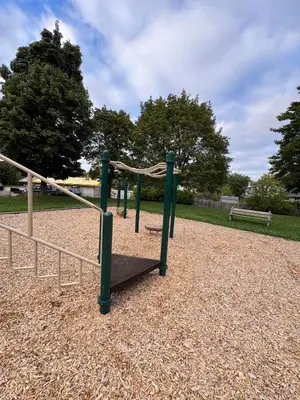 a playground with a swing set in a park at Waterloo Paradise with Rec room, Workspace, Park and close to St Jacobs Market in Waterloo