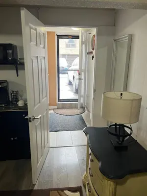 a hallway with a door leading to a garage at Pau-Rae's Cozy Spot - your home away from home! in Thornhill