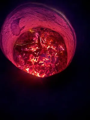 a pink glass bowl with red lights in it at Hespeler Haven Hideaway in Cambridge