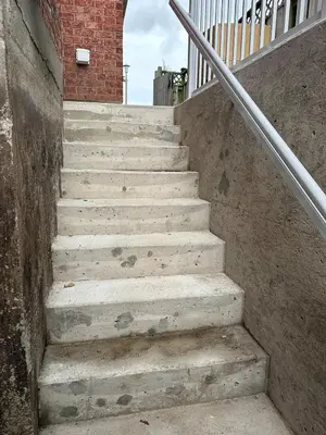 a set of stairs leading up to a building at New 2 bedroom basement in Cambridge in Cambridge