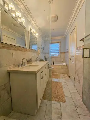 a bathroom with a sink and a shower and a tub at Ensuite in New Home with Parking, Close to Bluffers Park, Lake Ontario, 15 Mins to Downtown in Toronto