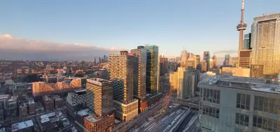 an aerial view of a city with tall buildings at Skyline Suite 1-Bed Penthouse in heart of Downtown Toronto in Toronto