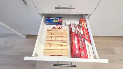 a book shelf filled with books in a refrigerator at Nordic Three Brantford in Brantford