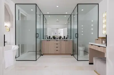 a bathroom with a shower and a toilet and a sink at Vineyard Estate by the River with Pool in Niagara on the Lake