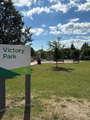 a sign for a visitor park in a park at Cozy 3BR House Near Airport & Transit! in Mississauga