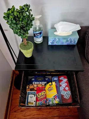 a table with a tray of snacks and a potted plant at Cozy 3BR House Near Airport & Transit! in Mississauga