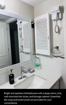 a bathroom with a sink with a mirror at Renovated 4-Bedroom Upper-Unit Detached House 5 Beds Near Toronto Pearson Airport in Toronto