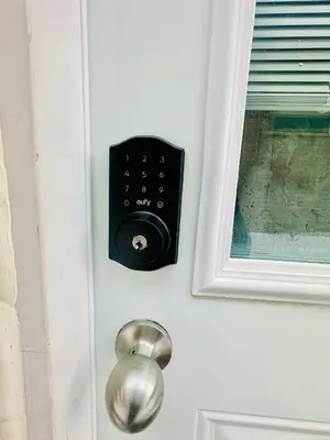 a door with a lock on a white door at Sky Cove - Modern Comfort, Simple, Cozy, Central in Saint Thomas