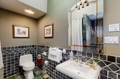 a bathroom with a sink and a toilet at Main House in Wasaga Beach