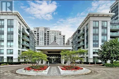 a large building with two trees in front of it at Entire Place With Pool Sauna in Vaughan