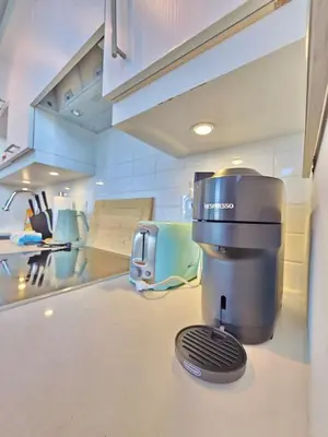 a coffee maker sitting on a counter in a kitchen at Entire 1BR Luxury Downtown Toronto Condo, Free Parking, Balcony in Toronto