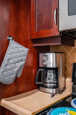 a coffee maker on a counter in a kitchen at Basement Suite for 2 w Private Patio in Toronto in Toronto