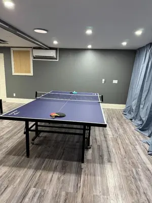 a ping pong room with a ping pong table at Nature & Comfort - Private Manor in Innisfil