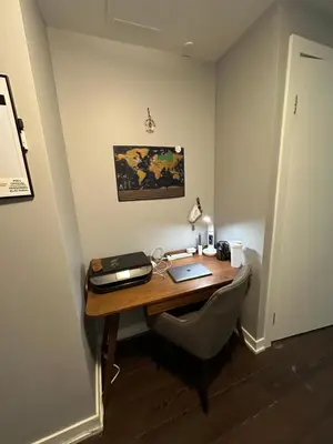 a desk with a laptop computer on top of it at Luxury smart condo downtown Toronto in Toronto