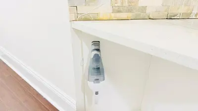 a kitchen counter with a hair dryer on a counter at Newly Renovated Private Suite Separate Entrance in Richmond Hill