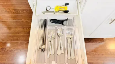 a drawer filled with utensils in a room at Newly Renovated Private Suite Separate Entrance in Richmond Hill