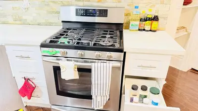a kitchen with a stove top oven in a kitchen at Newly Renovated Private Suite Separate Entrance in Richmond Hill