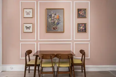 a dining room with a table and four chairs at Vintage Charm on Roncesvalles in Toronto