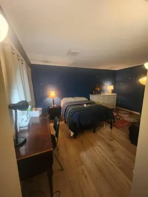 a bedroom with a bed and a desk and a desk at House near University of Waterloo, Perimeter Institute, Wilfred Laurier University in Waterloo