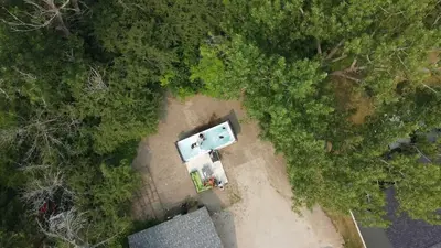 an aerial view of a campsite with a tent and trees at Best Location Chalet Walk to Village-Ski in Ski out Extra Large Hottub in Blue Mountains