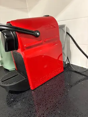a red toaster sitting on top of a counter at New Basement Apartment with parking in Oakville