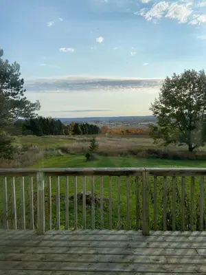 a view from the deck of a house at Beaver Valley Farmhouse with Pool & Stunning Views in Kimberley