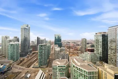 an aerial view of a city with tall buildings at Modern City Condo with Parking Walk to CN Tower in Toronto