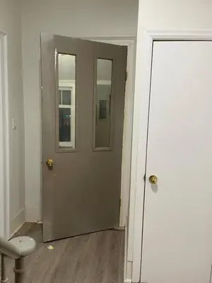 an empty room with a door in a room at Luxury room at southern Guelph in Guelph