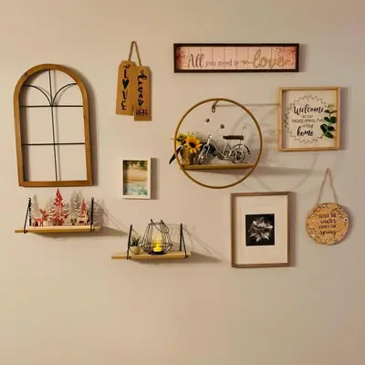 a wall with pictures and mirrors on a wall at Rice Lake Retreat 2 Bed Home 16 Ft Swim spa Sauna in Bailieboro