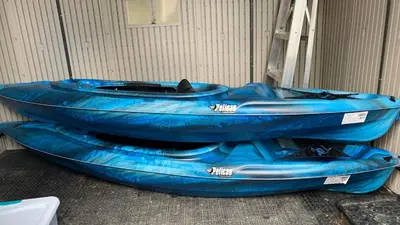 two blue tubes sitting next to a wall at Rice Lake Retreat 2 Bed Home 16 Ft Swim spa Sauna in Bailieboro