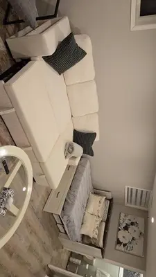 an overhead view of a room with a bed and towels at Cozy East Hill 2026 in Belleville