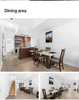 a kitchen and a dining area with a table and chairs at Basek Apartments in Toronto