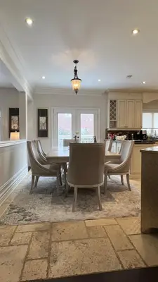 a kitchen and dining room with a table and chairs at Executive Luxury Stay Corporate Paradise in South Richvale in Richmond Hill