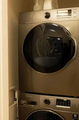 a microwave oven sitting on top of a appliance at Nova Luxury suites in Toronto