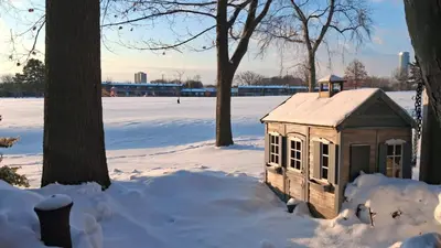 a dog house in the snow in a park at Parkside Modern Retreat in Mississauga